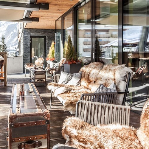 Hotel-Lederer's-Living-Kaprun-design-Hotel-fur-skins-on-the-terrace