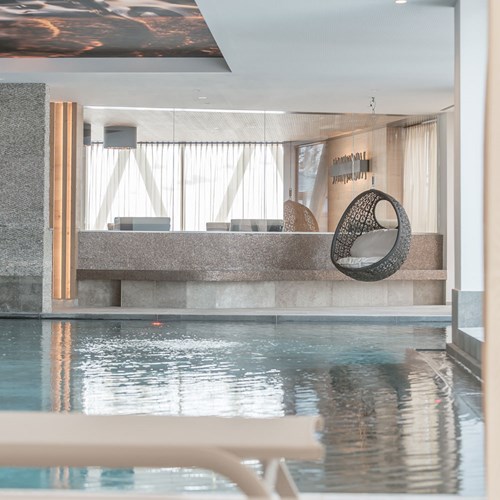 pool with egg chair at the Hotel Gurglhof, ski accommodation in Obergurgl