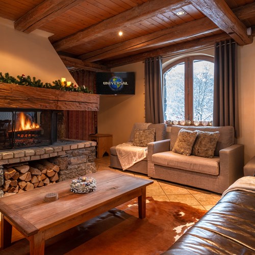 Fireside snug at Chalet Ophelia, ski chalet in Meribel