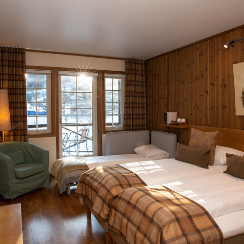 triple room with balcony Flamsbrygga Hotel in Flam, Norway