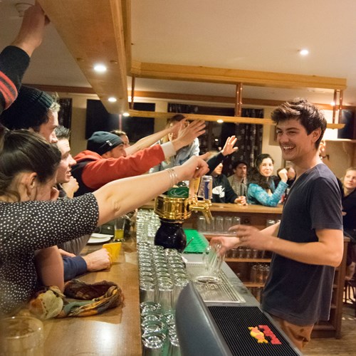 Getting a drink at Bar des Guides, Hotel Suisse bar
