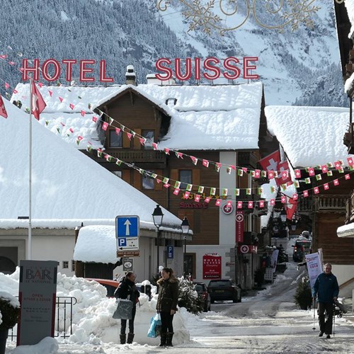 snow covered roof of the Hotel Suisse in Champery