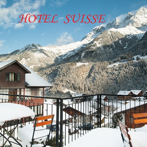Snowy view from the veranda at Hotel Suisse in Champery