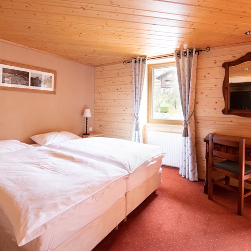 Standard twin room at Hotel Suisse in Champery