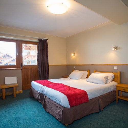 twin room at Chalet Hotel Les Grangettes in Meribel