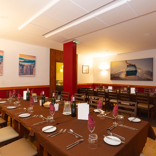 Dining room at Chalet Hotel Les Grangettes in Meribel