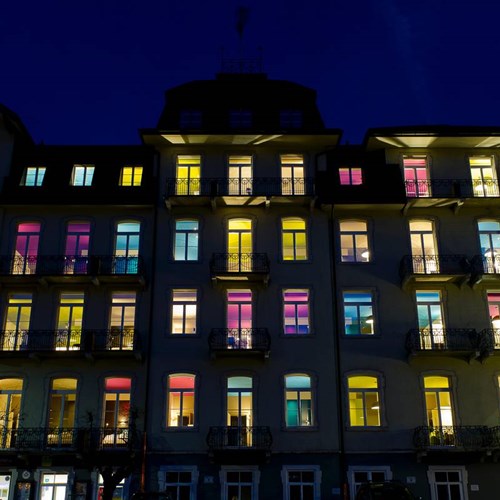 lit up front of the trendy Hotel Bellevue Terminus in central Engelberg