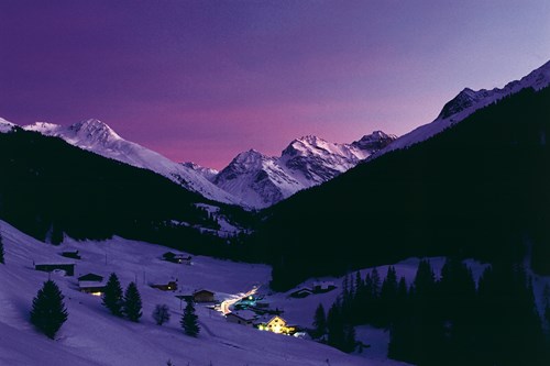 Klosters village at night, purple sky