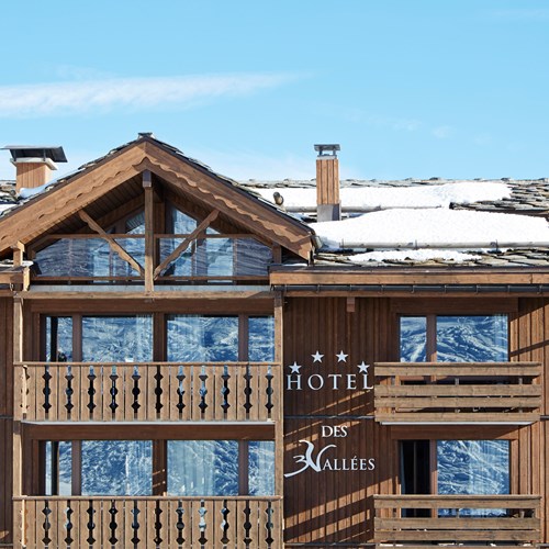 ski in ski out hotel Trois Vallees in Courchevel-exterior and blue skies
