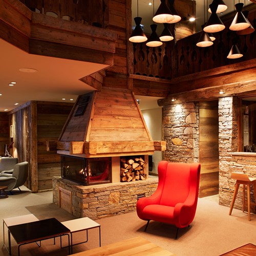 ski in ski out hotel Trois Vallees in Courchevel-fireplace in seating area