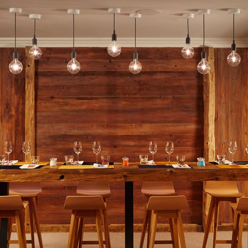 ski in ski out hotel Trois Vallees in Courchevel-wooden dining table