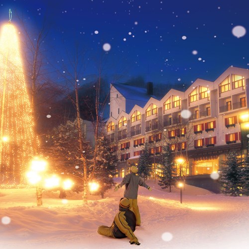 Rusutsu Resort Hotel - Japan skiing - exterior at night with lights