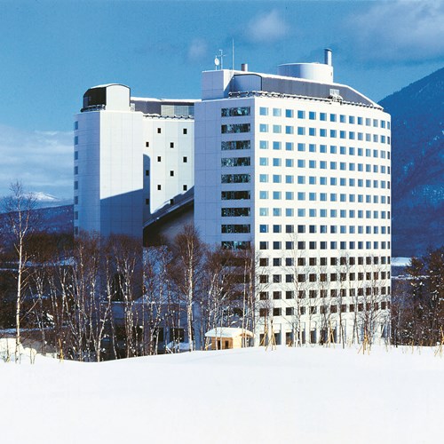 Ski Hotel Hilton Niseko Village - Japan skiing - blue hotel exterior