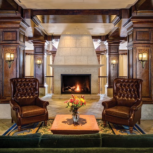 Lobby with armchairs and fire, Sun Peaks Grand ski accommodation in Canada