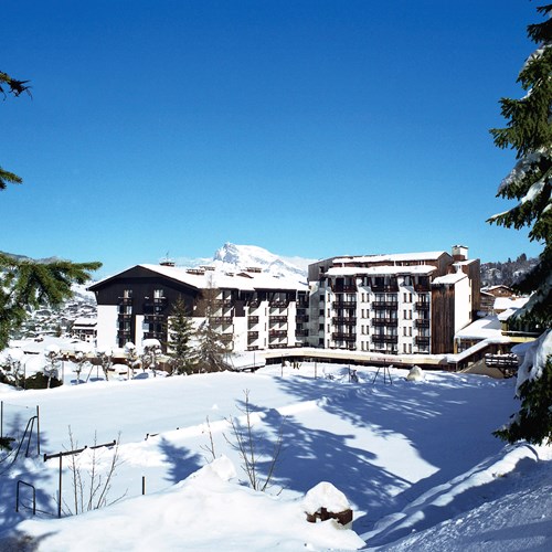Exterior in the snow at Rochebrune Hotel in Megeve, ski hotel France
