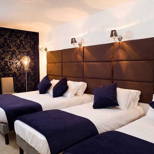 courchevel-olympic-courchevel-1850-quad-room.jpg