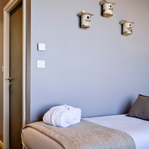 Aiguille Grive Chalets hotel, slope-side ski hotel in Les Arcs, twin room