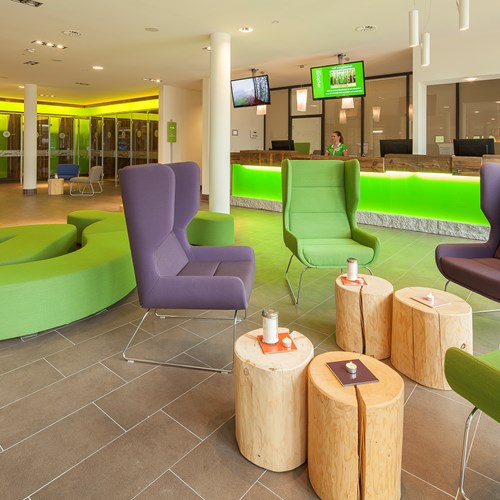 Lounge and reception at Explorer Hotel, ski accommodation in St Johann