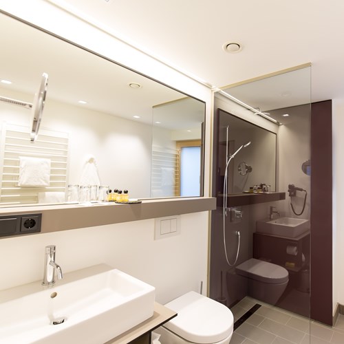 En suite at Hotel & Wirtshaus Post, ski accommodation in St Johann, Austria