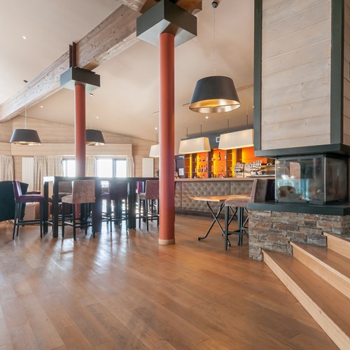 Residence L'Amara Avoriaz France bar area seating and large fire