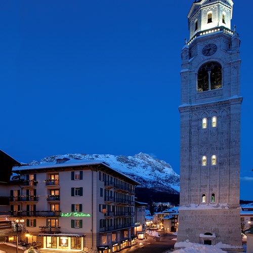 beside the clocktower Hotel Cortina ski accommodation