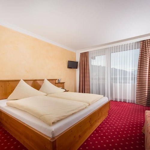 Double room at Hotel Fischer, ski accommodation in St Johann, Austria
