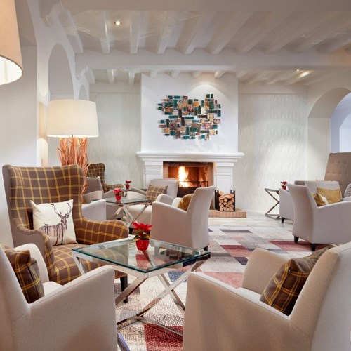Hotel Das Alpenhaus, ski accommodation Bad Hofgastein, Austria, lobby fire