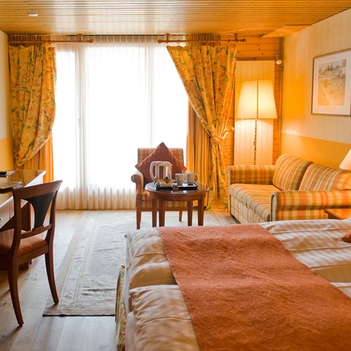 Jungfrau view room with a balcony at the Hotel Silberhorn Wengen