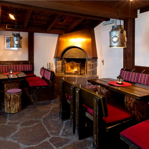 roaring fire and lounge of Hotel Silberhorn Wengen, Switzerland