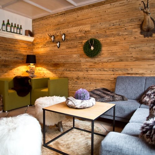 Hotel Gamshof-kitzbuhel ski accommodation-lounge with fur throws